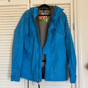 Burton ski/snowboarding jacket. Removal powder belt in the jacket